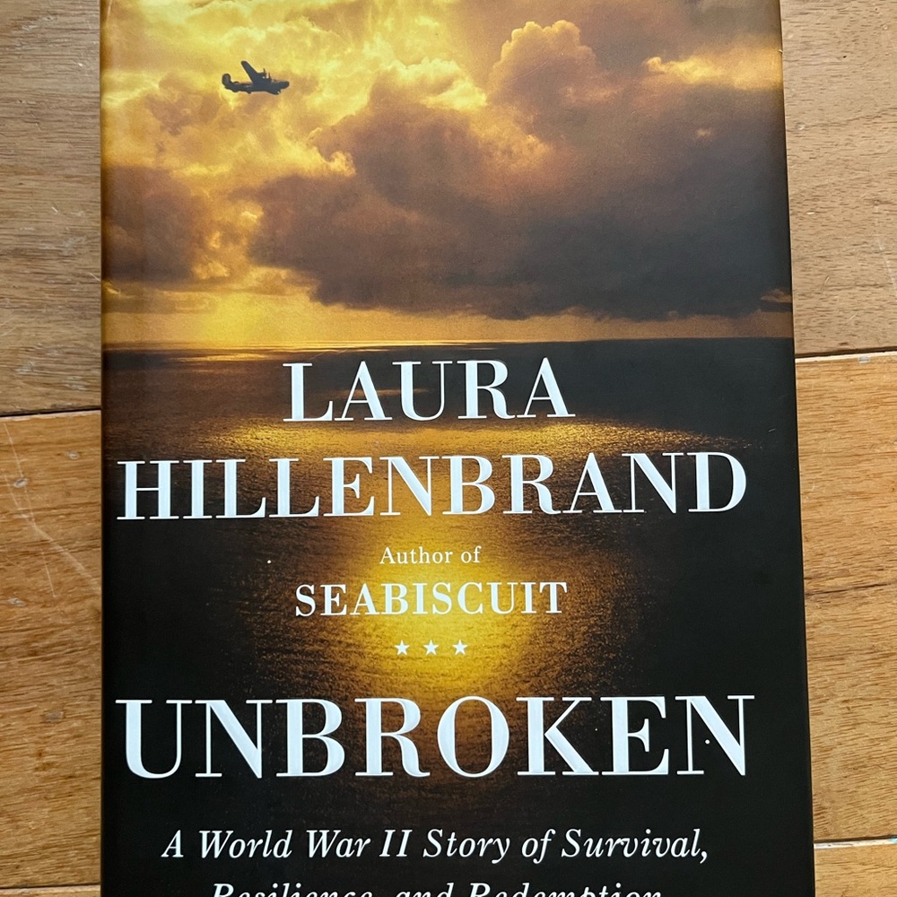 Unbroken by Laura Hillenbrand - Hardcover Book - Black & Gold Cover